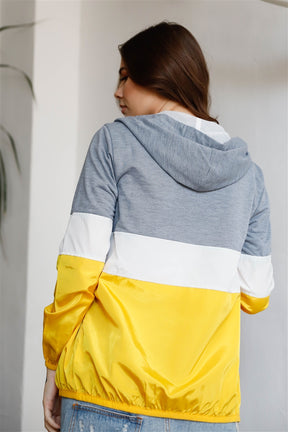 Veste coupe-vent à capuche zippée colorblock