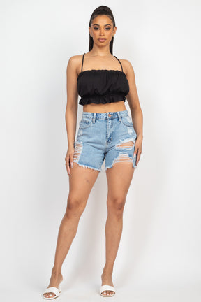 Mini short en jean déchiré à cinq poches