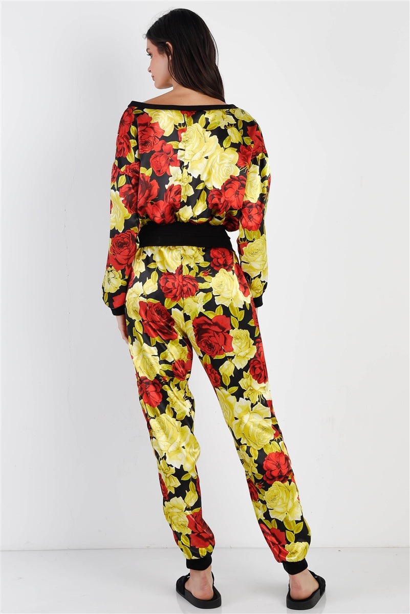 Ensemble haut et pantalon à col en V et imprimé floral rouge et citron vert effet satiné noir